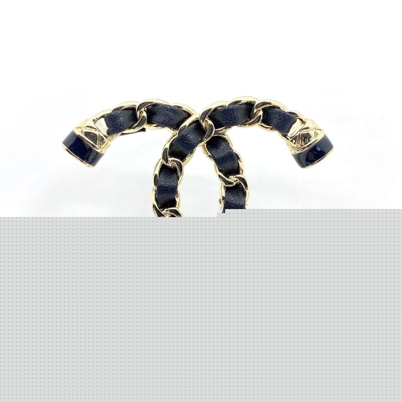 Ch*el brooches